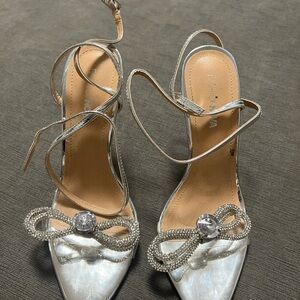 Fashion Nova Silver Rhinestone Bow Heels